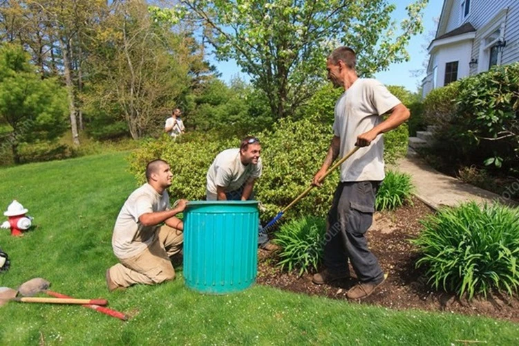 Image of a Landscape Contractor mowing the lawn using a zero turn mower